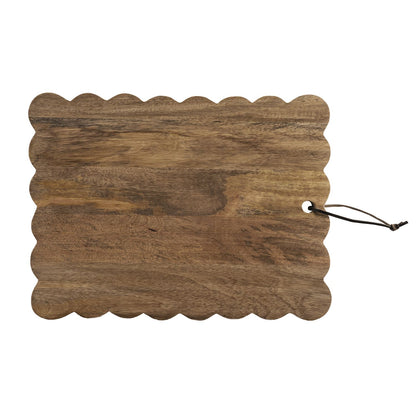 top view of wood scallop board shown on a white background