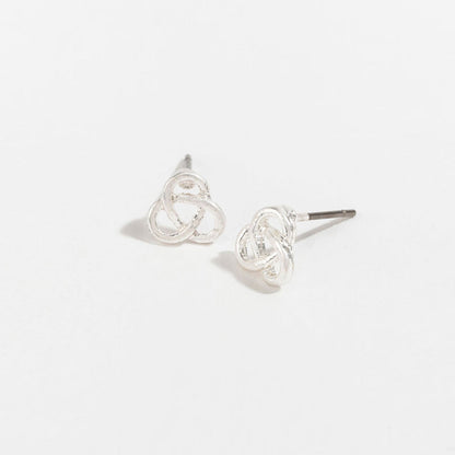 silver trinity stud earrings on a white background