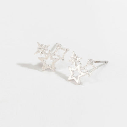 silver star cluster stud earrings on a white background