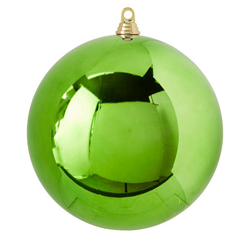 shiny light green ball ornament on a white background