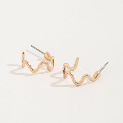 gold wiggle hoop stud earrings on a white background