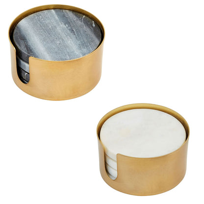 white marble and black marble coaster sets in their brass caddies.