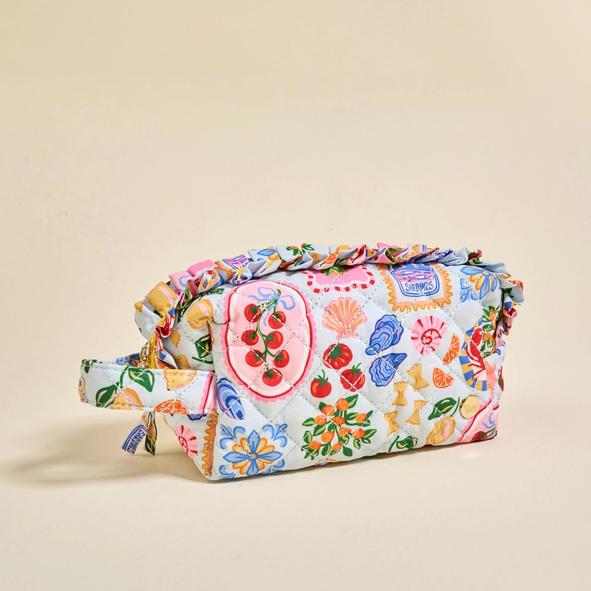 Colorful fabric bag with a pattern on a beige background
