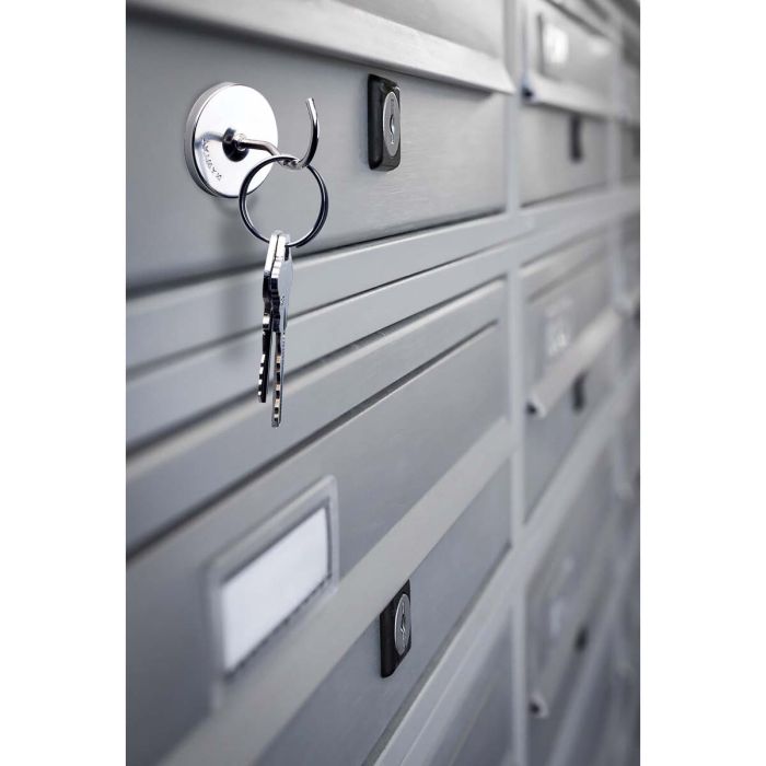 Magnetic Hooks on a metal filing cabinet with keys hanging on it