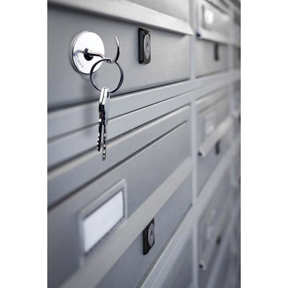 Magnetic Hooks on a metal filing cabinet with keys hanging on it