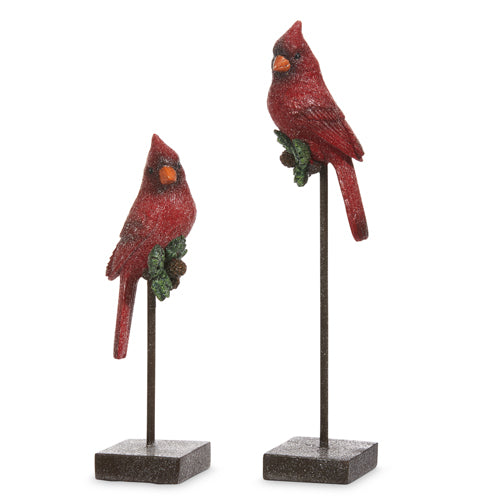 2 sizes of pedestals with bright red cardinals sitting on them displayed against a white background.