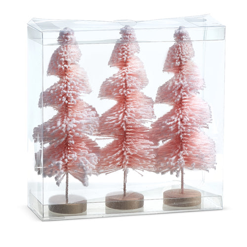 all three pink snowy bottle brush trees displayed in the clear packaging against a white background