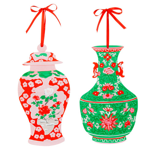 both styles of ginger jar ornaments with reds, pinks, and greens with red ribbon for hanging and displayed against a white background