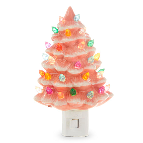 vintage pink tree with christmas lights night light against a white background