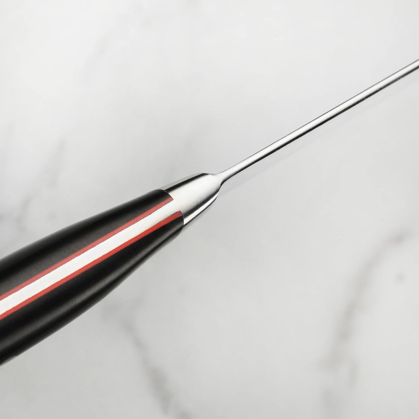 close-up of handle on 6 inch Chef's Knife