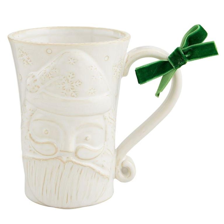 White Christmas Mug with Santa design and green velvet bow tied on the handle.