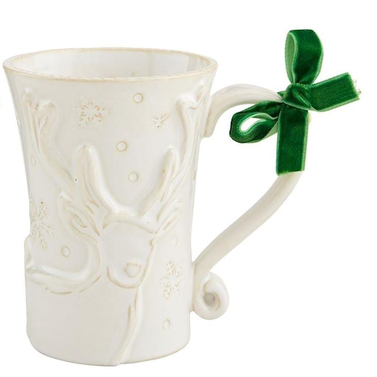 White Christmas Mug with reindeer design and green velvet bow tied on the handle.