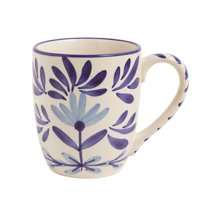 white mug with light and dark blue floral design 