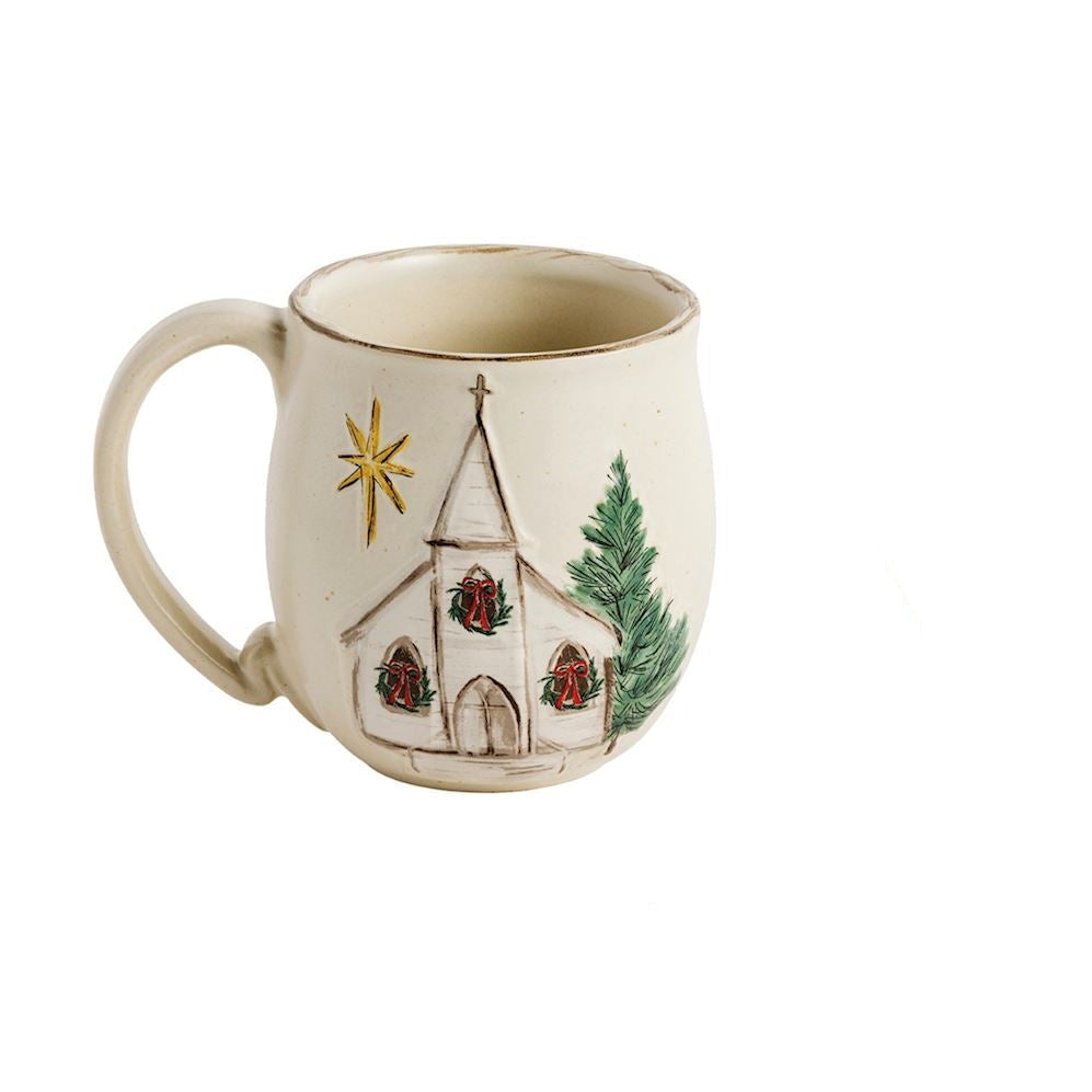 mug with christmas church design painted on it