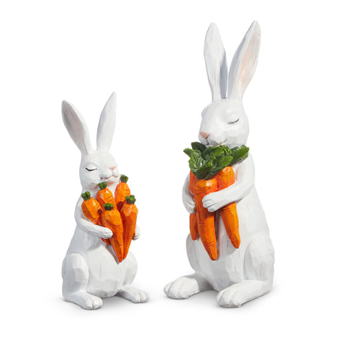 2 sizes of white bunnies holding carrots on a white background.