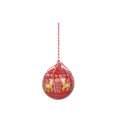 red ball ornament with intricate christmas design painted on it.