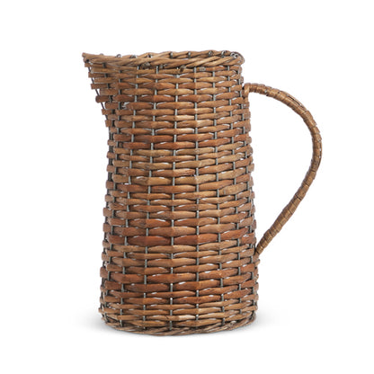 small woven pitcher on a white background.