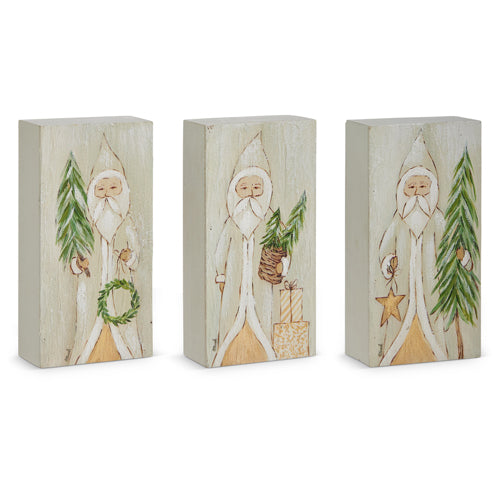 2 assorted styles of santa art on wooden blocks.