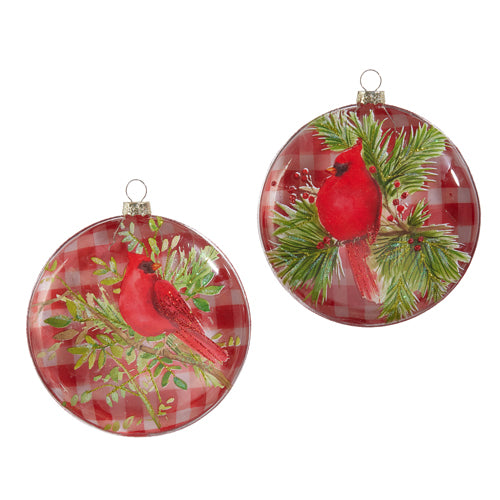 glass ornaments with cardinals and evergreens painted on the a red gingham background.