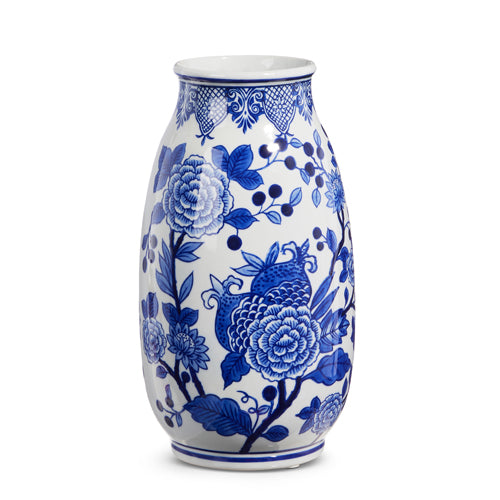 tall round white vase with blue floral pattern.