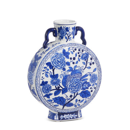 round blue and white floral vase with neck and handles.