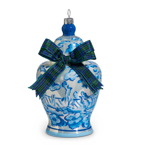 Glass Ginger Jar ornament with blue and white pattern and a blue and green plaid bow tied on it.