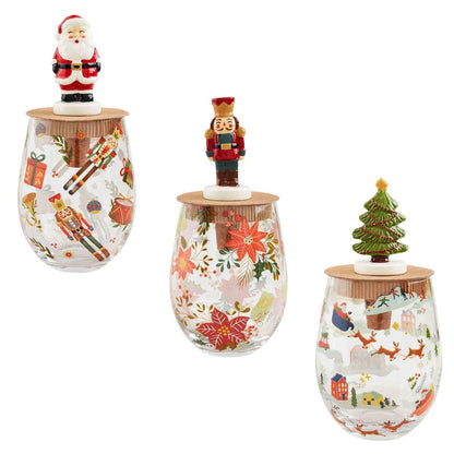 all three styles of christmas pattern wine glass and stopper sets displayed against a white background