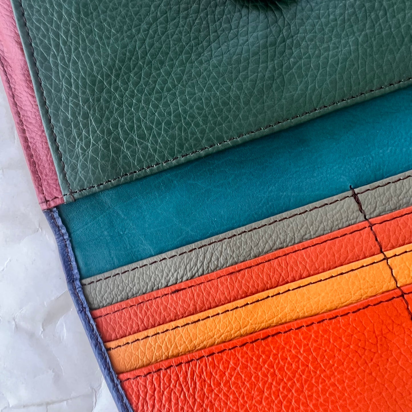 close-up of secret clutch colorful card slots.