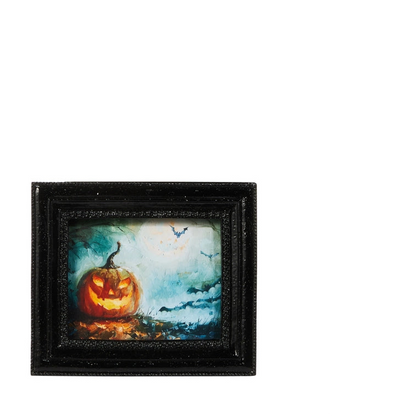 small halloween themed art print of a glowing jack-o-lantern set against a spook night sky in texture black frames