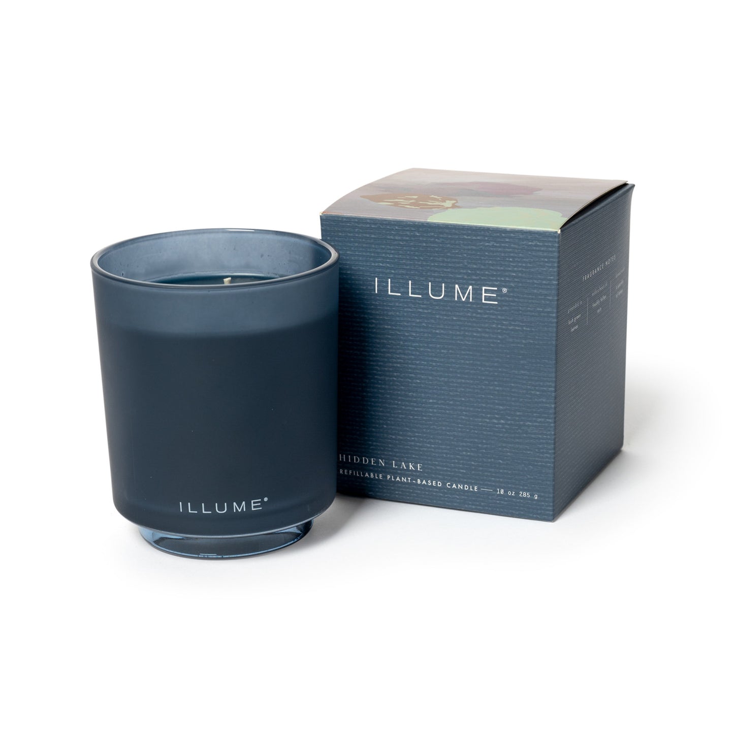 Hidden Lake Boxed Glass Candle next to its box