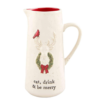 eat, drink and be merry deer pitcher with red interior displayed against a white background