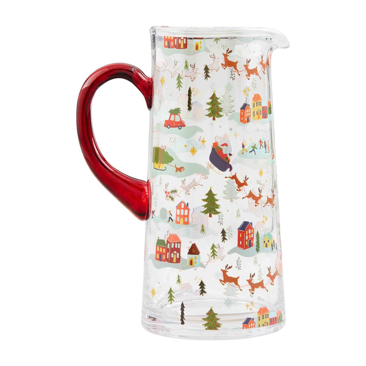 christmas village pitcher displayed against a white background