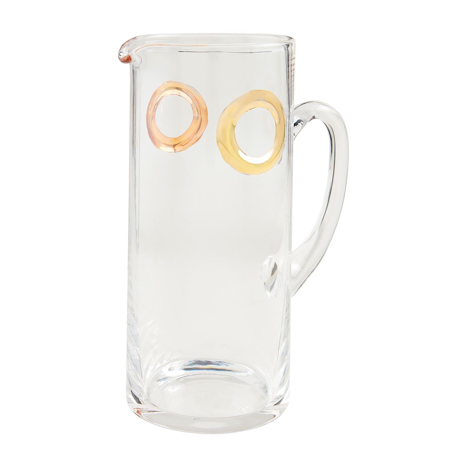 glass pitcher with gold circles around the top on a white background.