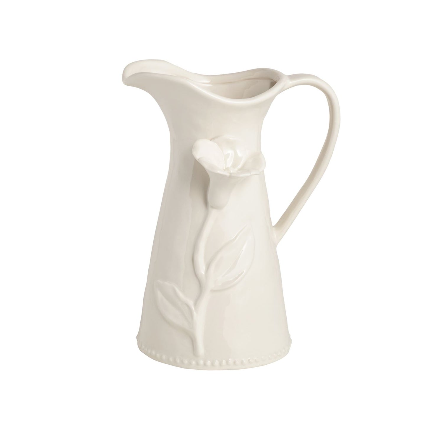White ceramic pitcher with floral design on a white background