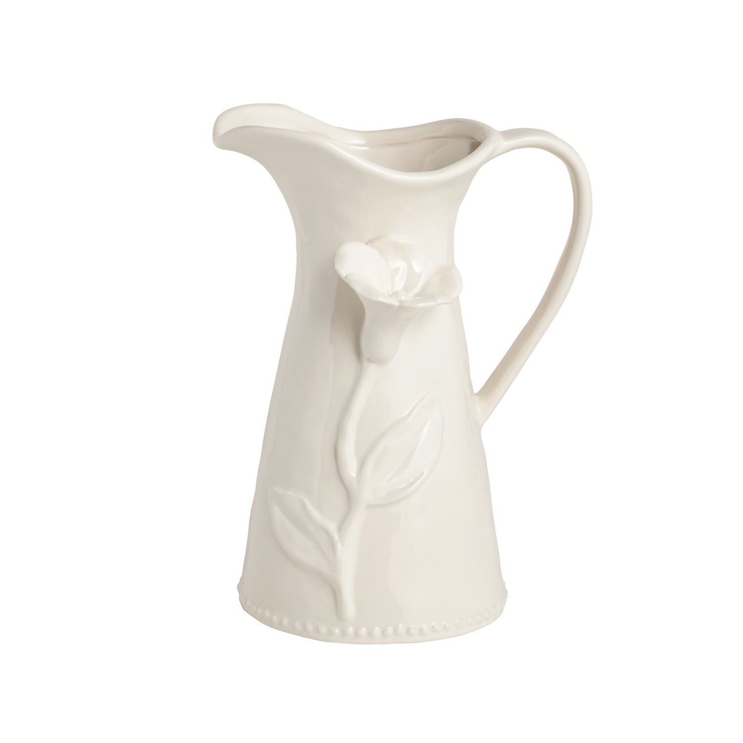 White ceramic pitcher with floral design on a white background
