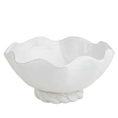 white ceramic bowl with a twisted base shown on a white background