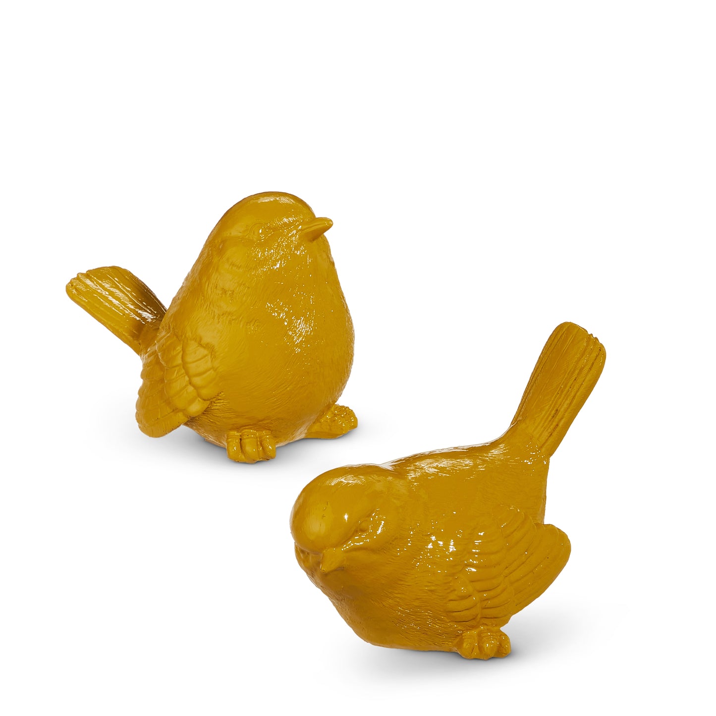 yellow bird figurines on a white background