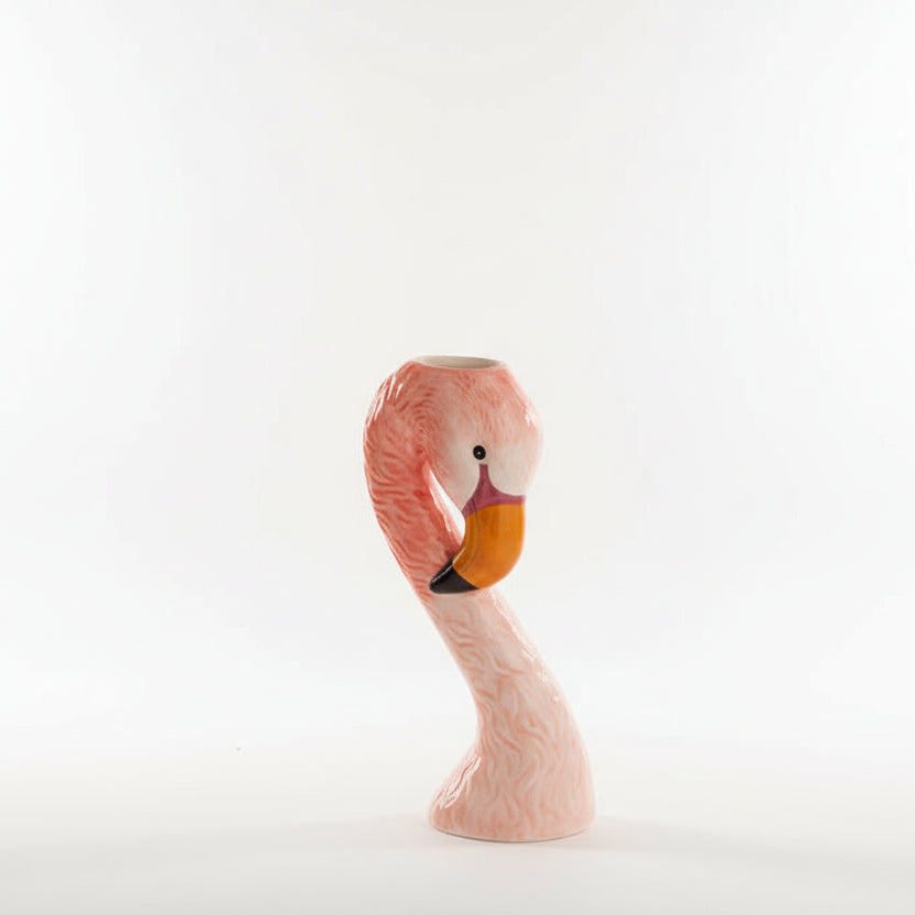 small pink Flamingo-shaped vase on a white background