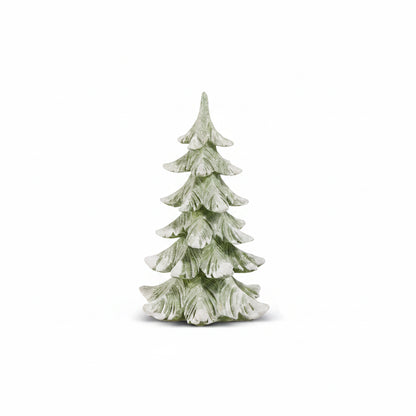 small decorative tree with snow effect on a white background