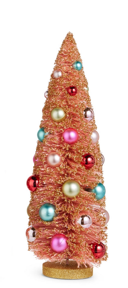large pink bottle brush trees dusted with gold glitter and embellished with colorful ornaments on a white background
