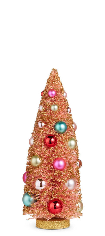 medium pink bottle brush trees dusted with gold glitter and embellished with colorful ornaments on a white background