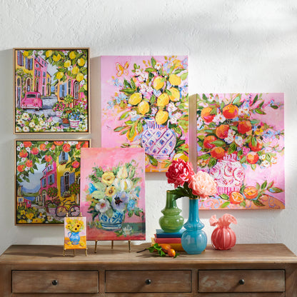 assorted of vase and artwork arranged in a decorated setting