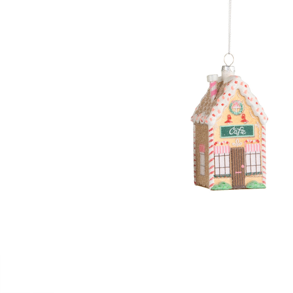 "cafe" house ornament candy details, pink and white striped awnings and a wreath at the top