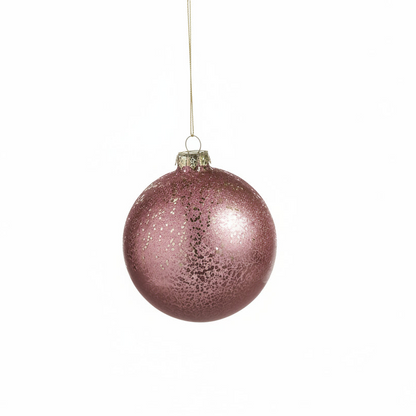 pink glittered ball ornament shown on a white background