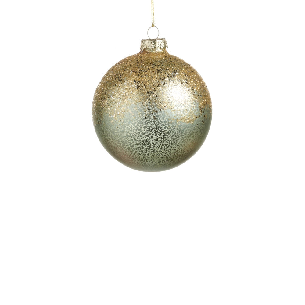 pale green ball ornament with golden glitter shown on a white background