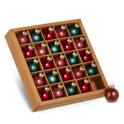 Box of Red and Green Ball Ornaments on a white background