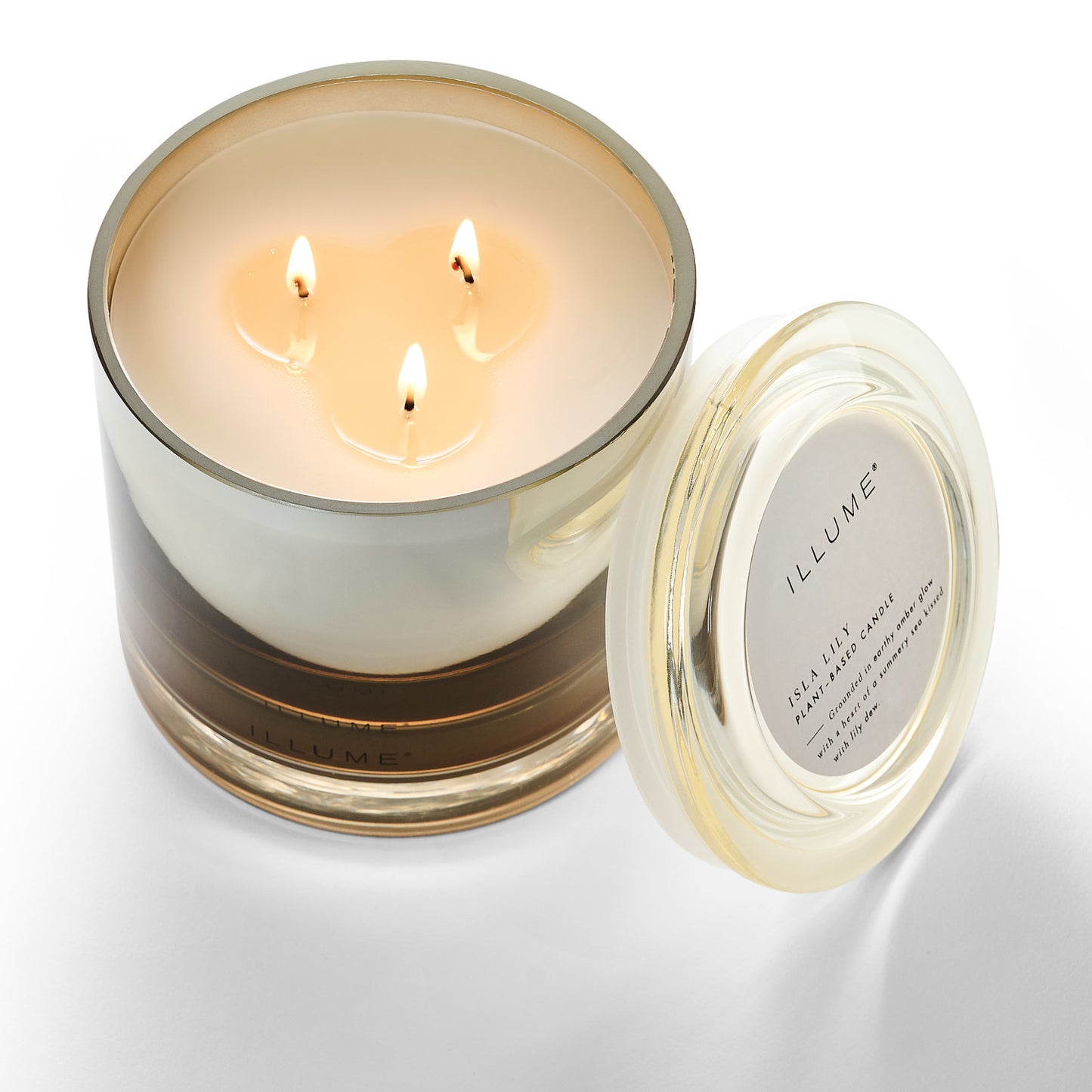 Isla Lily Statement Glass Candle with its lid next to it