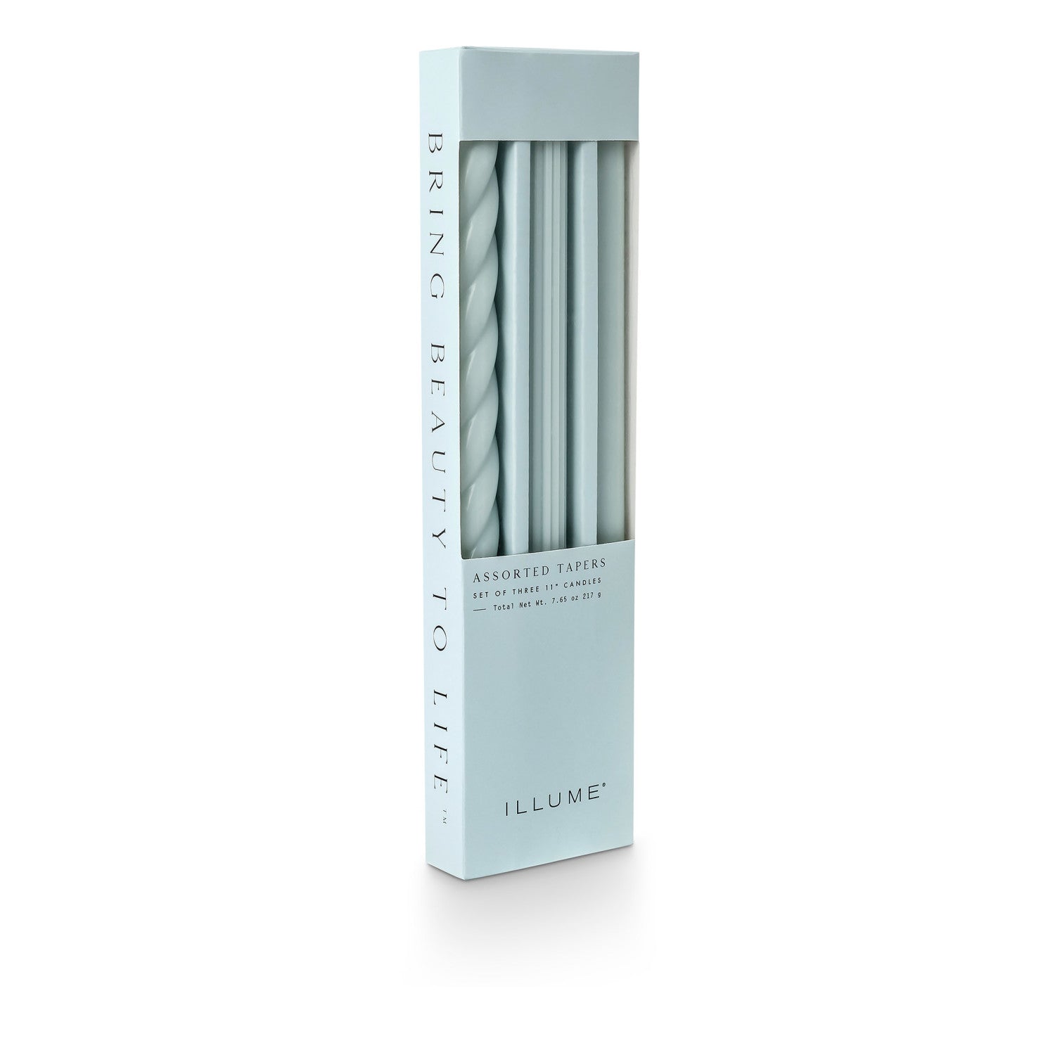 three assorted light blue taper candles in their packaging