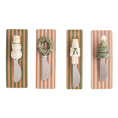 4 whtie christmas spraders on a white background