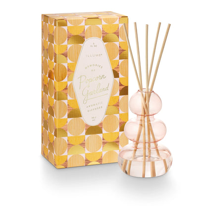Popcorn Garland Bubbled Diffuser set next to its box packaging